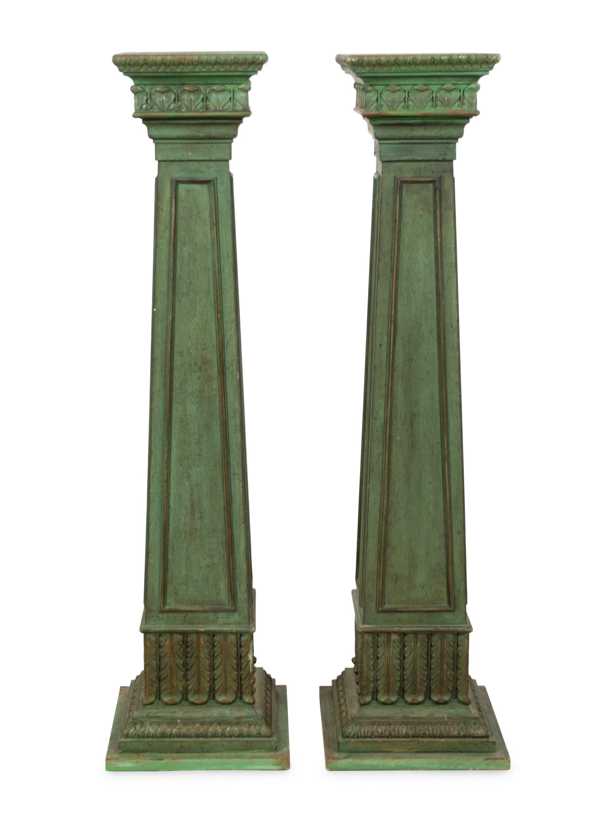 A Pair of Green-Painted Carved Wood Pedestals