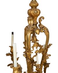 A Gilt Bronze Rococo Style Fourteen-Light Chandelier
