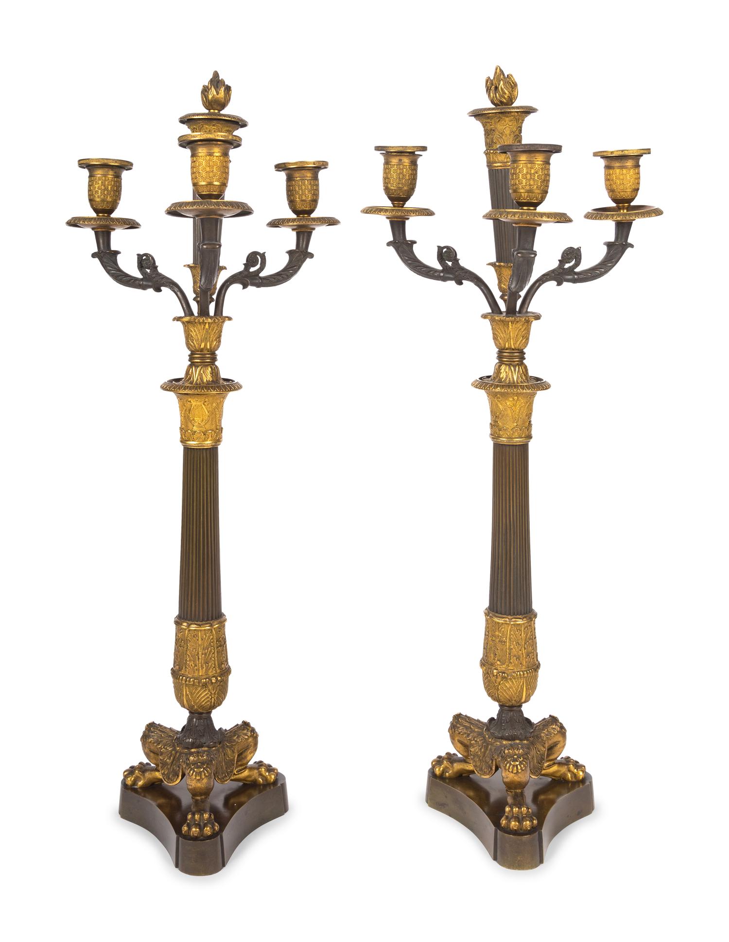 A Pair of Louis Philippe Patinated and Gilt Bronze Three-Light Candelabra