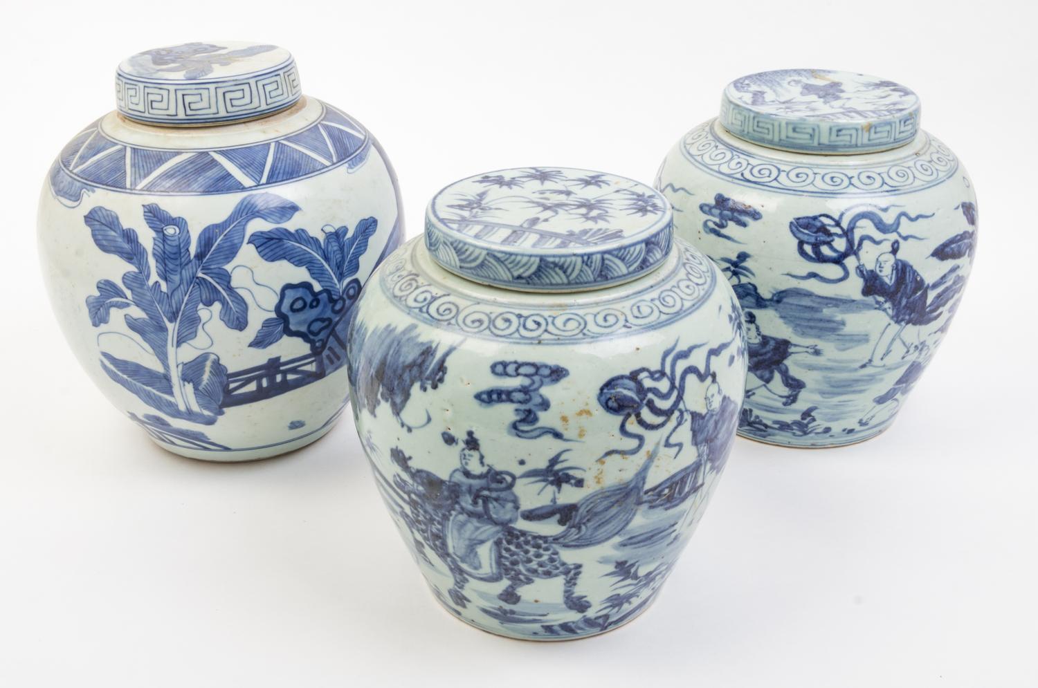 Three Blue and White Porcelain Jars and Covers Height of tallest 10 inches.