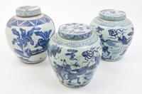 Three Blue and White Porcelain Jars and Covers Height of tallest 10 inches.