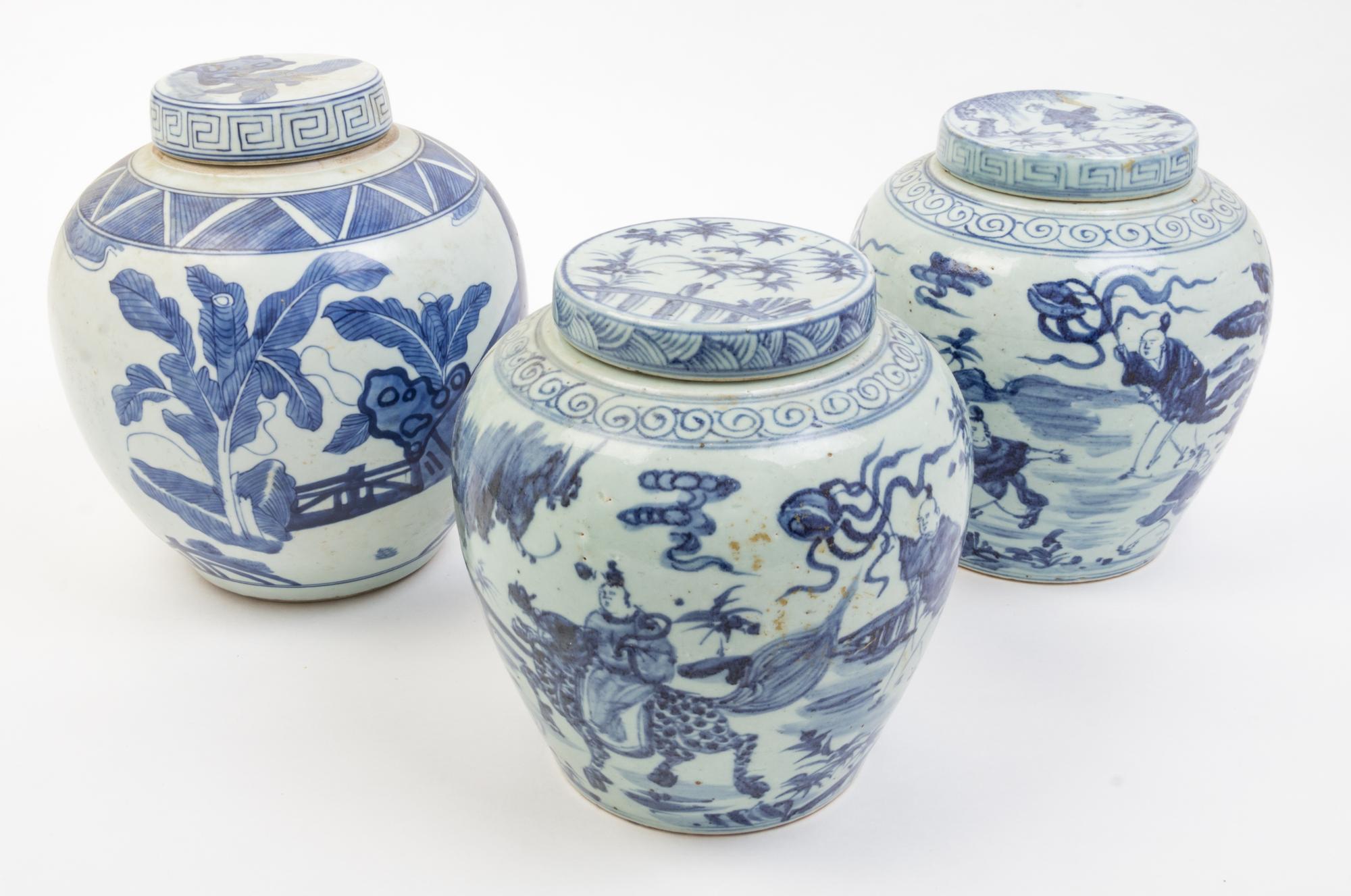 Three Blue and White Porcelain Jars and Covers Height of tallest 10 inches.
