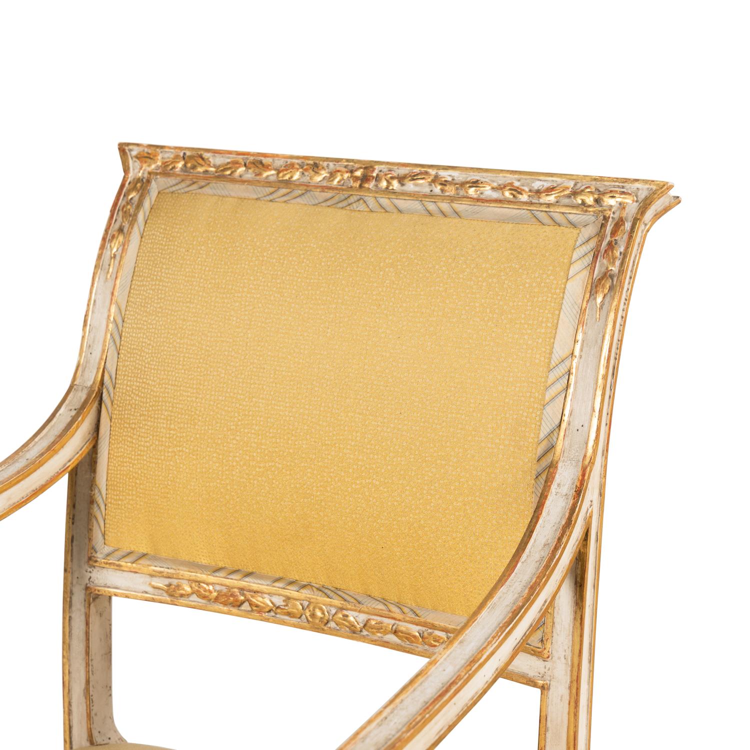 A Pair of Italian Neoclassical Style White-Painted and Parcel Gilt Fauteuils