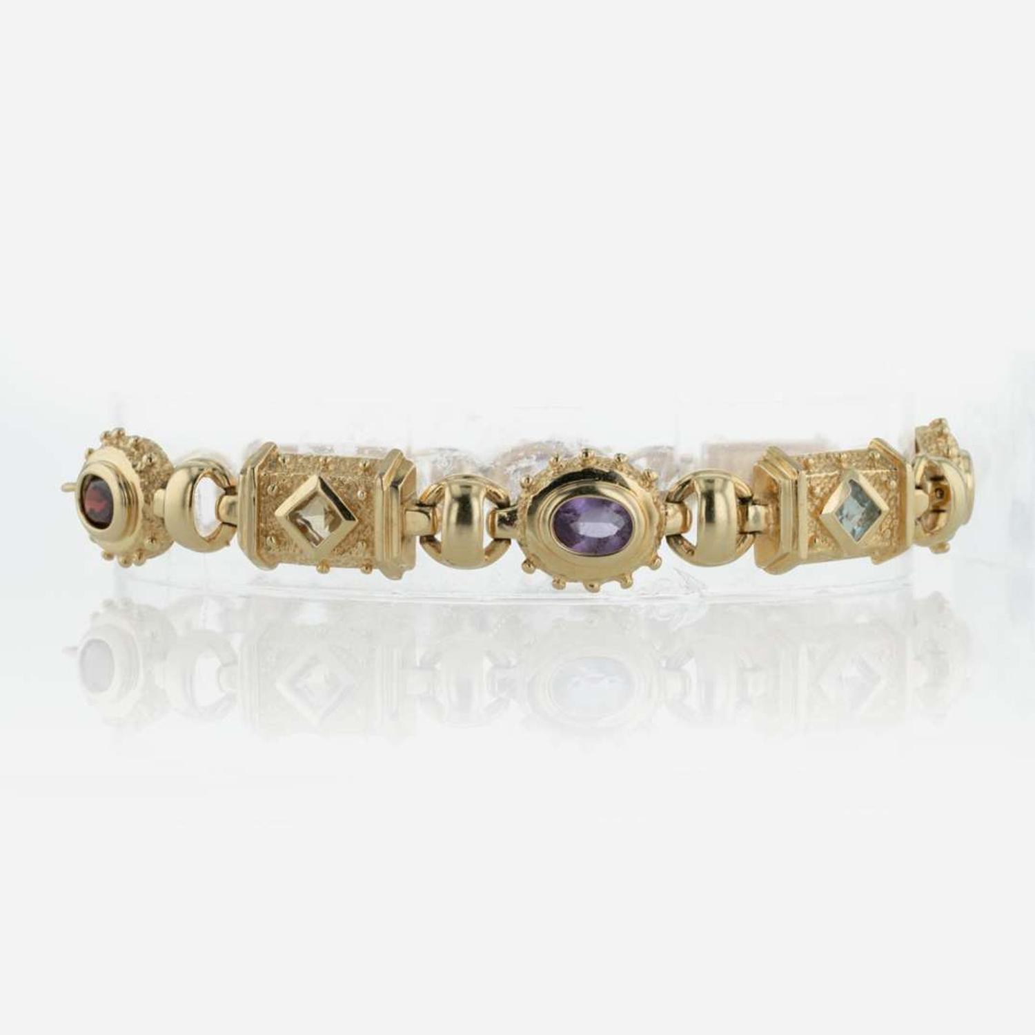 A Set of 14K Yellow Gold and Gemstone Jewelry