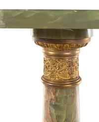 A Neoclassical Gilt Metal Mounted Onyx Pedestal