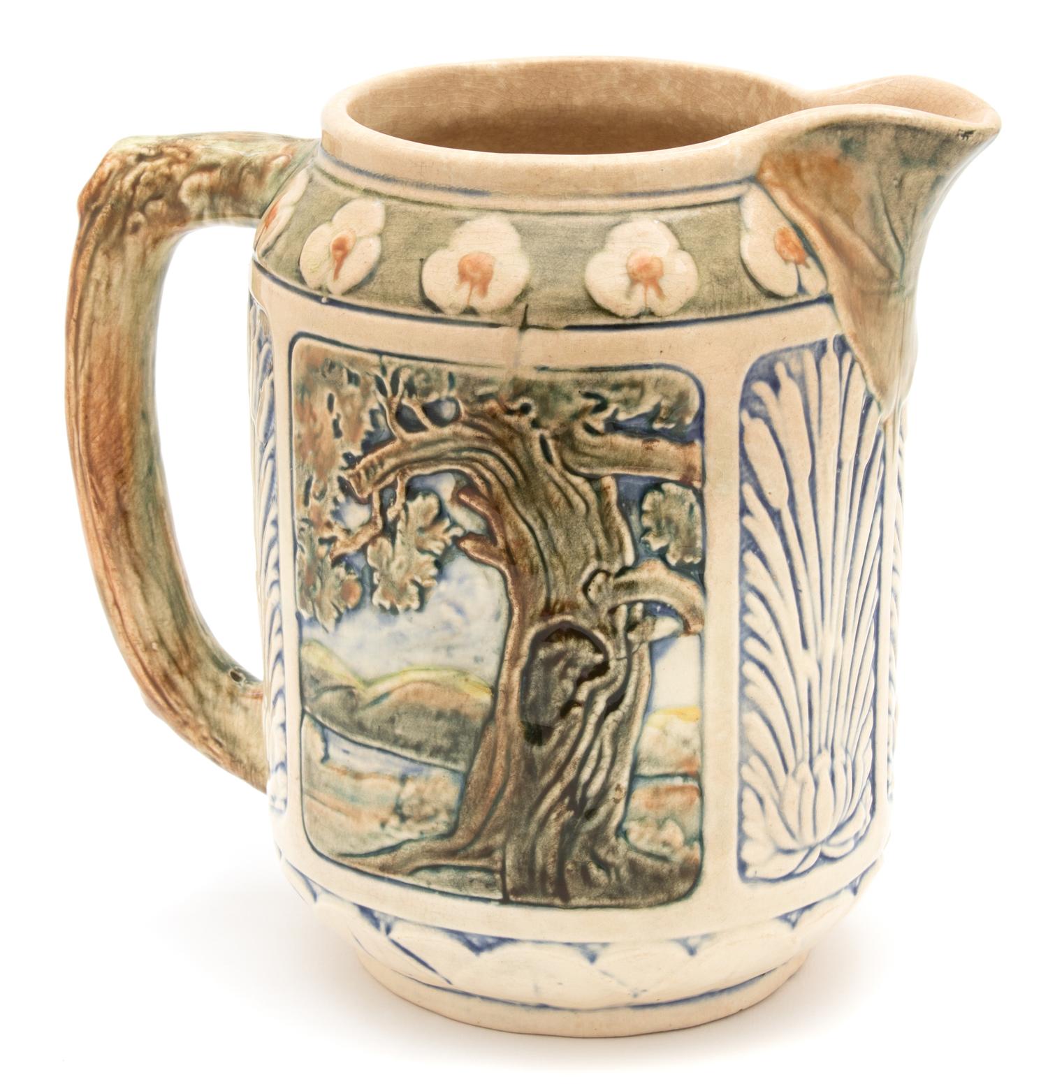 A Weller Pottery Zona Kingfisher Pitcher Height 8 1/2 inches. — 20TH CENTURY