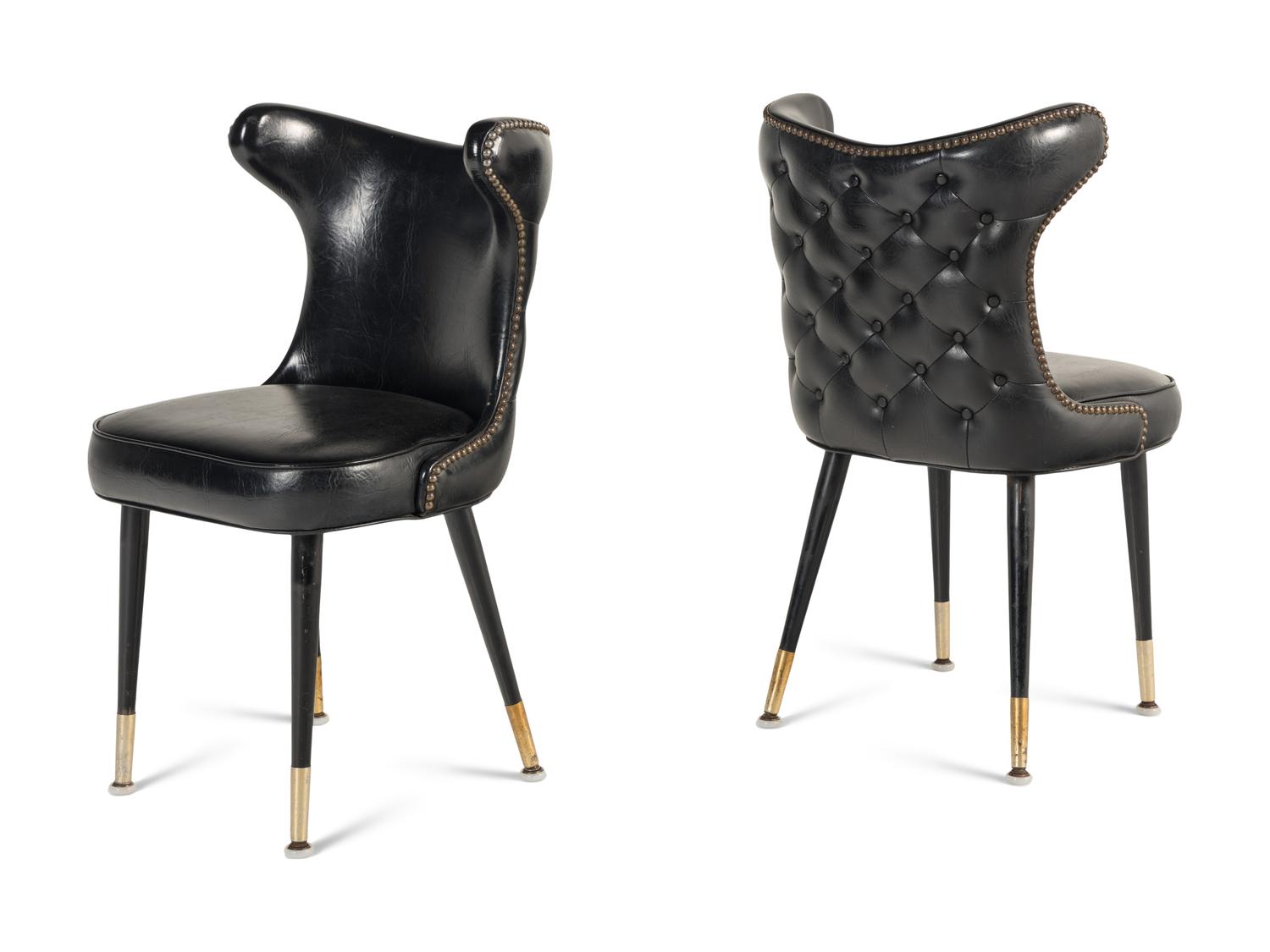 A Set of Six Leather-Upholstered Wingback Chairs