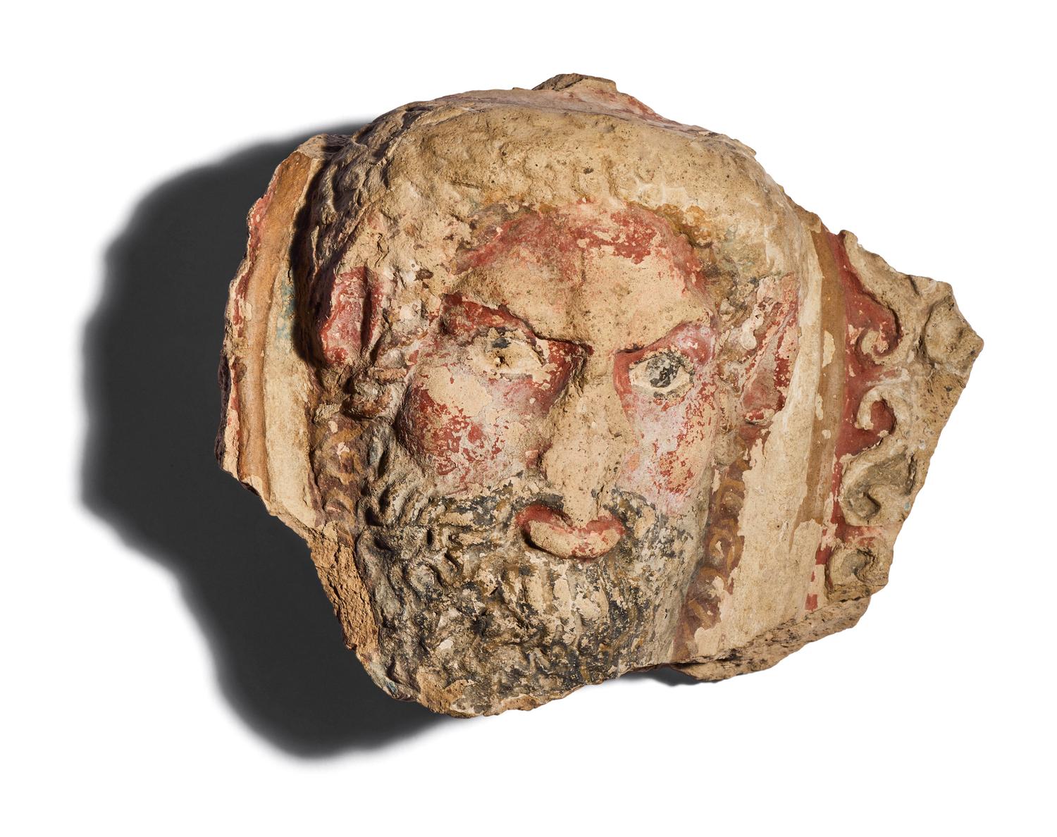Two Etruscan Terracotta Antefix Fragments
