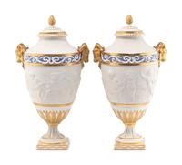 A Pair of Sèvres Style Biscuit Porcelain Vases and Covers
