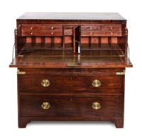 A Campaign Style Mahogany Secretaire Chest of Drawers Height 39 1/2 x width 38 x depth 20 inches — CIRCA 1910