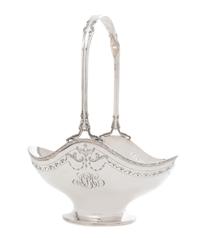 An American Silver Flower Basket, International Silver Co., Meriden, CT, First Half 20th Century, the foliate scroll handle above the o