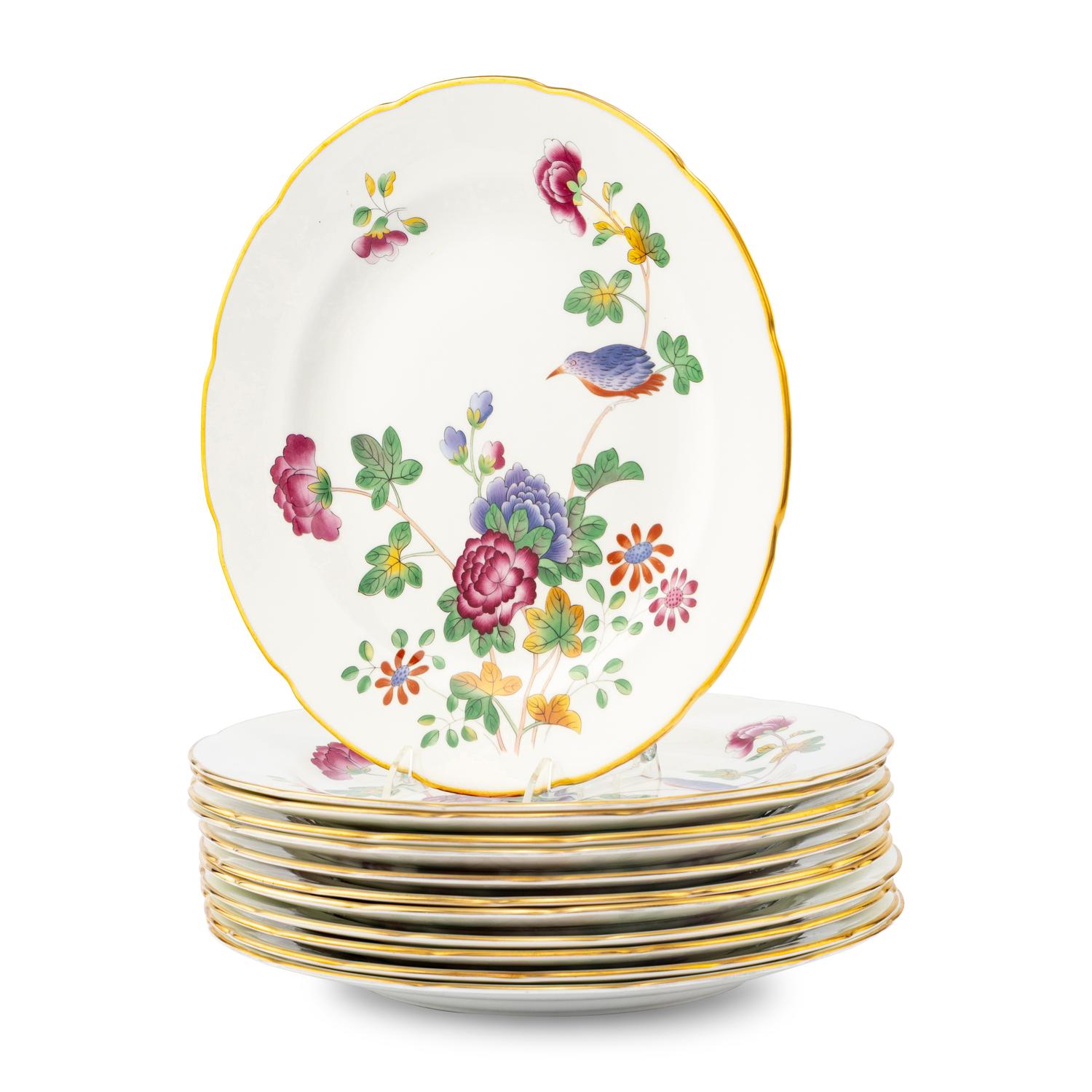 A Set of Twelve Wedgwood Cuckoo Porcelain Dinner Plates