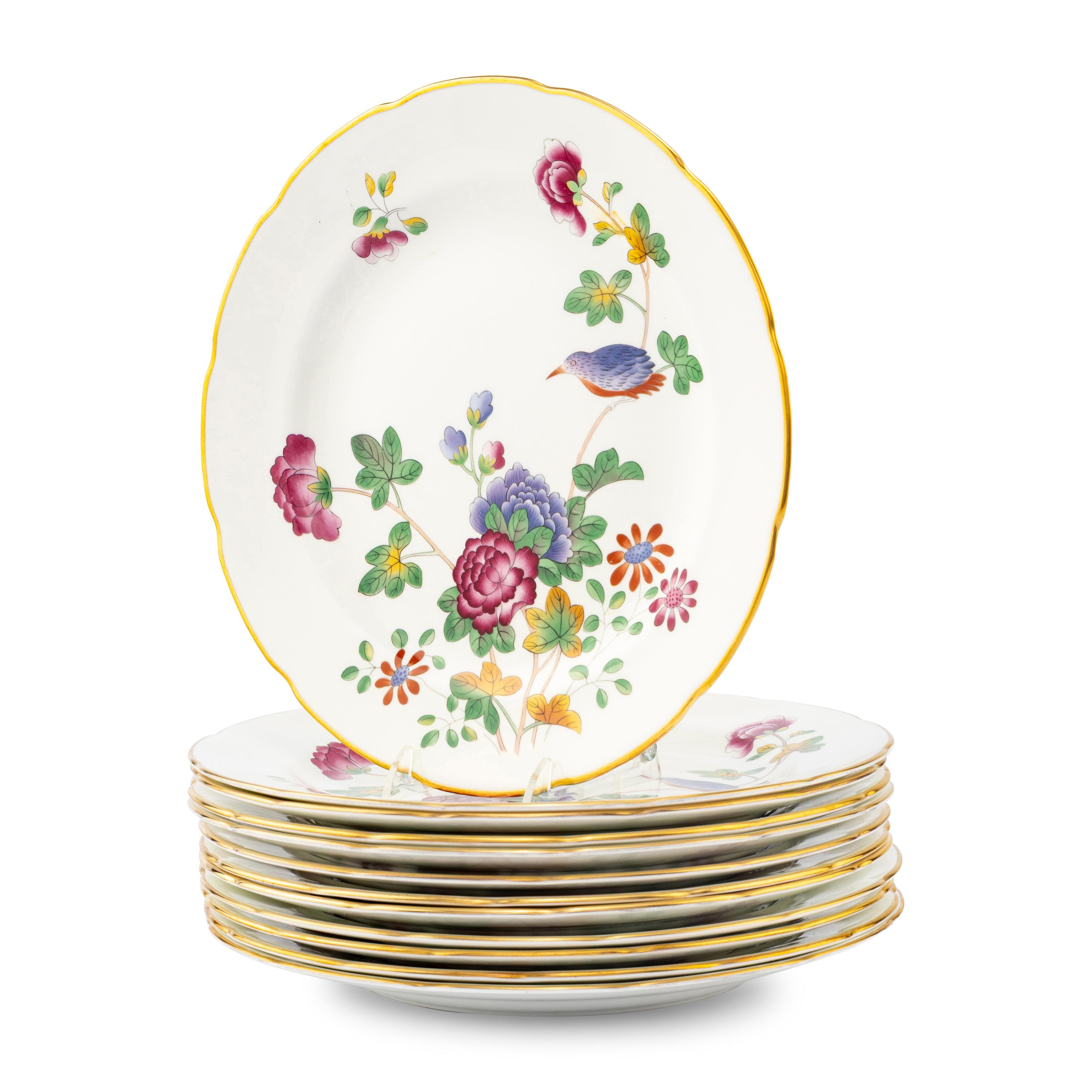 A Set of Twelve Wedgwood Cuckoo Porcelain Dinner Plates
