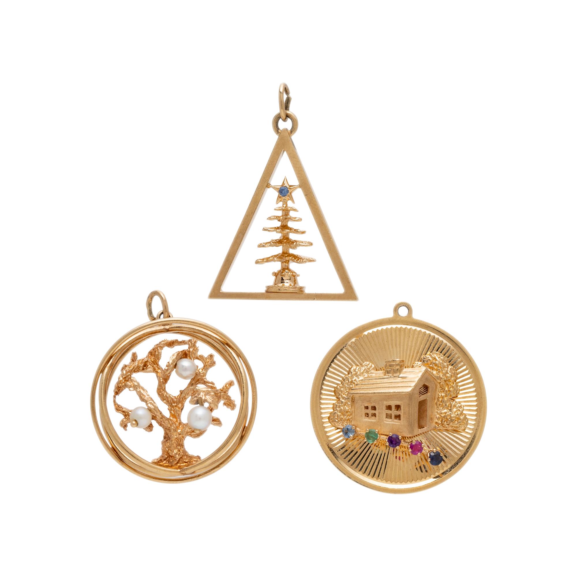 COLLECTION OF YELLOW GOLD CHARMS