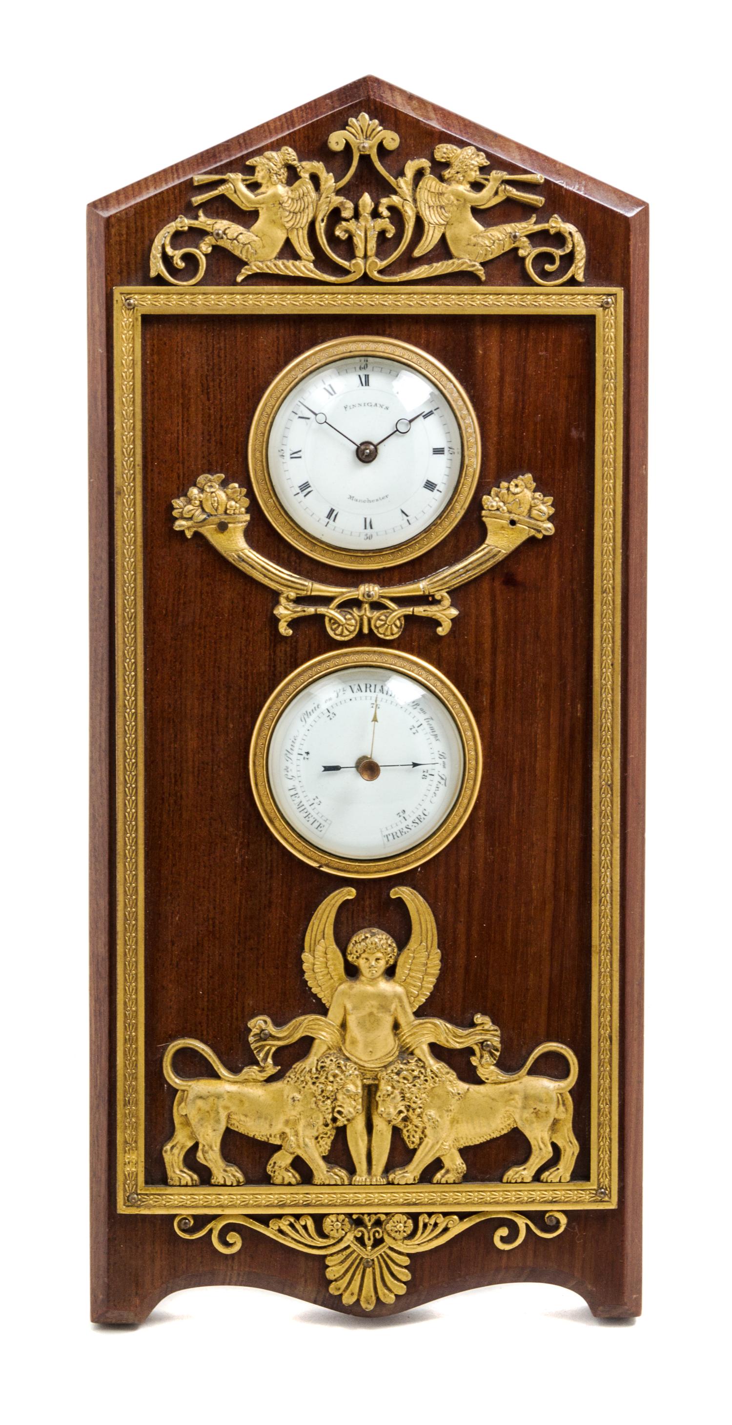 An Empire Style Gilt Bronze Mounted Mahogany Desktop Clock and Barometer Height 14 inches. — LATE 19TH CENTURY