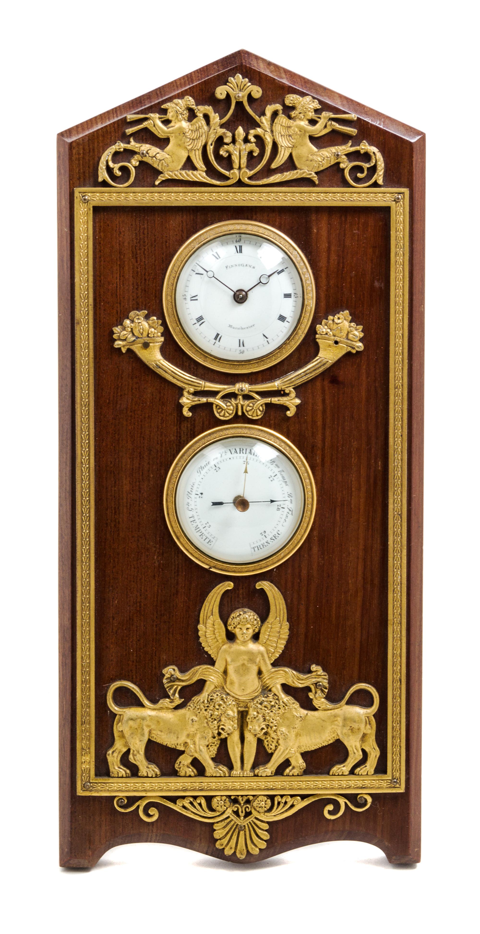 An Empire Style Gilt Bronze Mounted Mahogany Desktop Clock and Barometer Height 14 inches. — LATE 19TH CENTURY