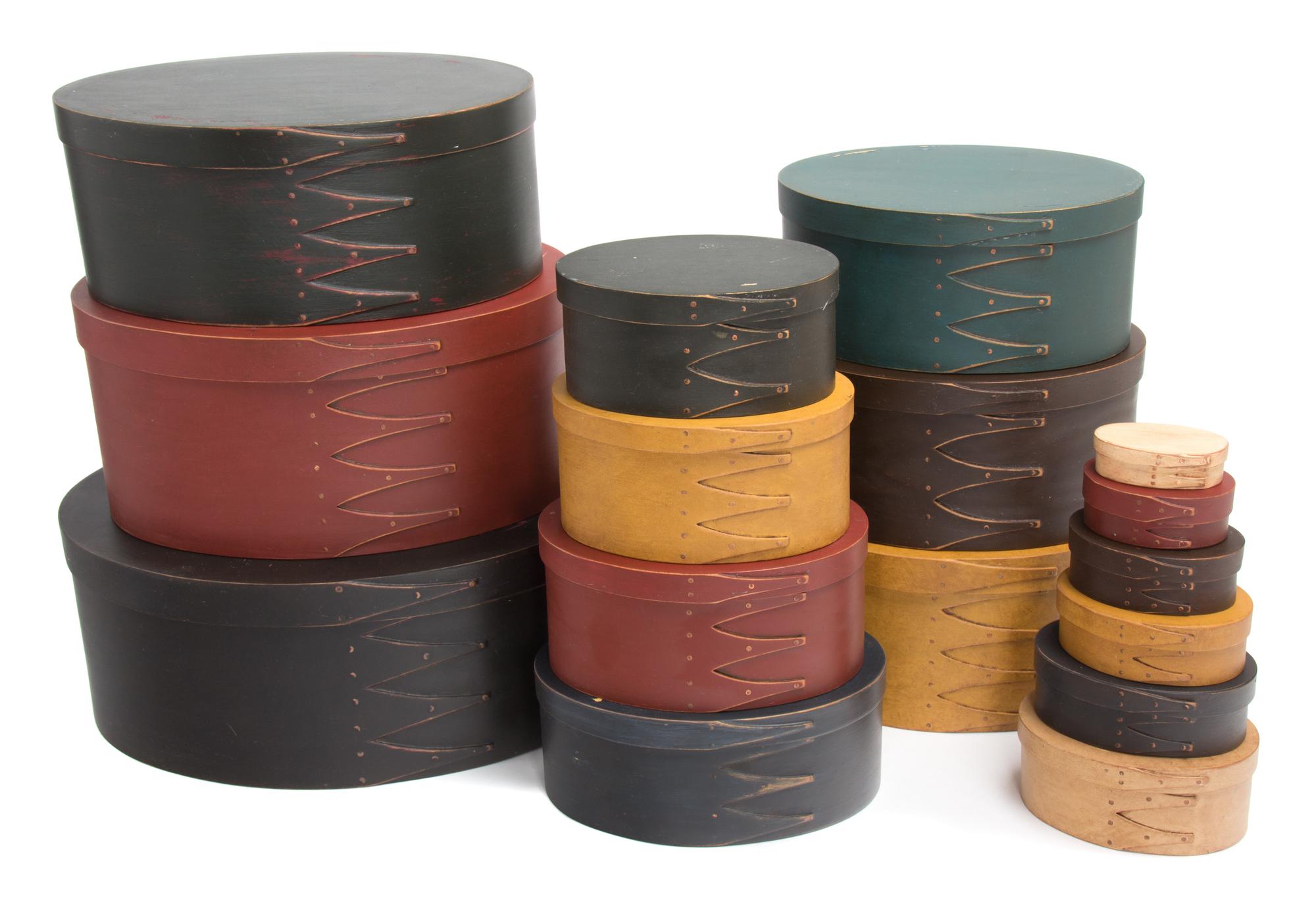 A Collection of Sixteen Shaker Style Painted Oval Boxes Length of longest 14 1/4 inches. — 20TH CENTURY