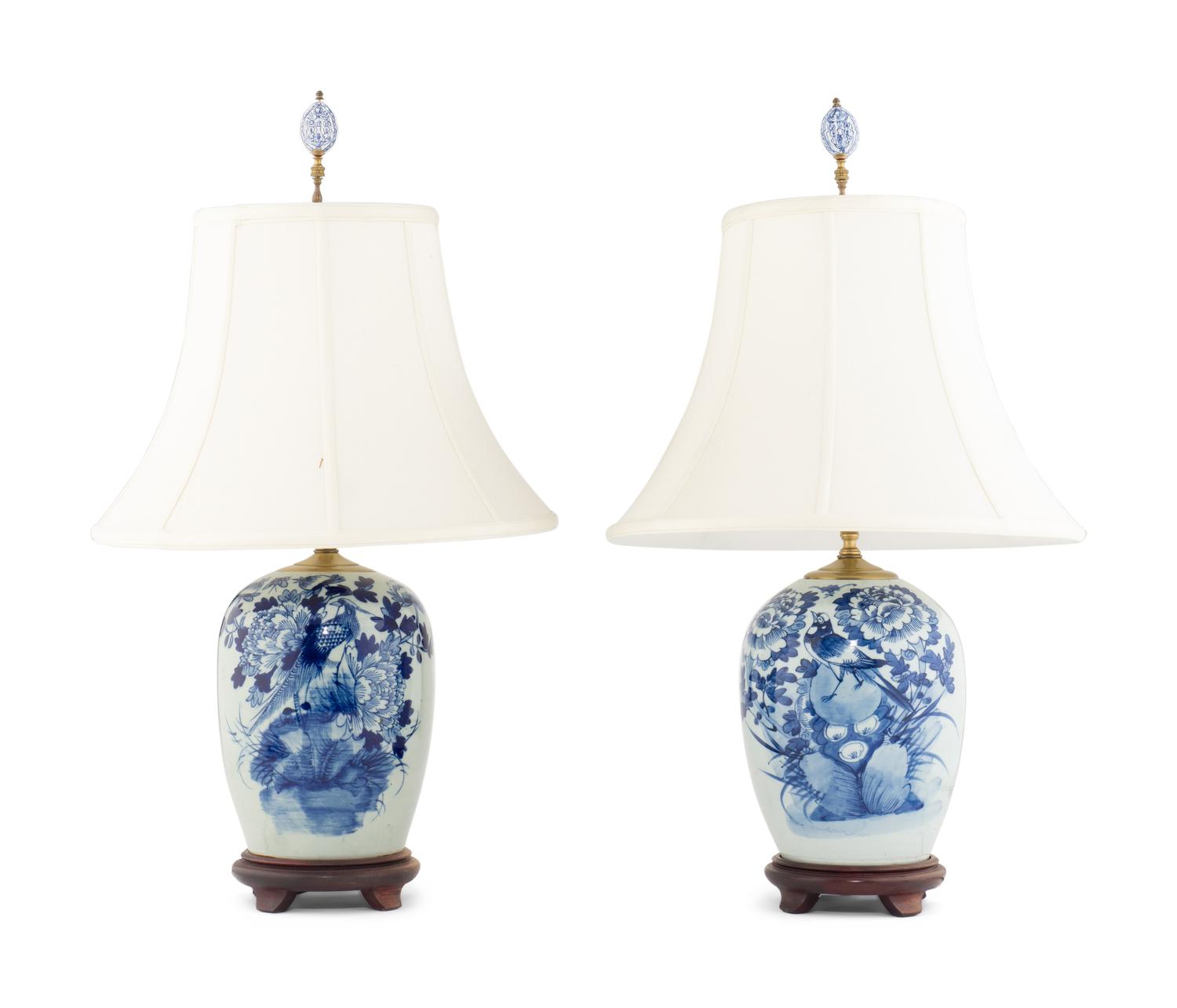 A Pair of Blue and White Porcelain Jars Mounted as Lamps