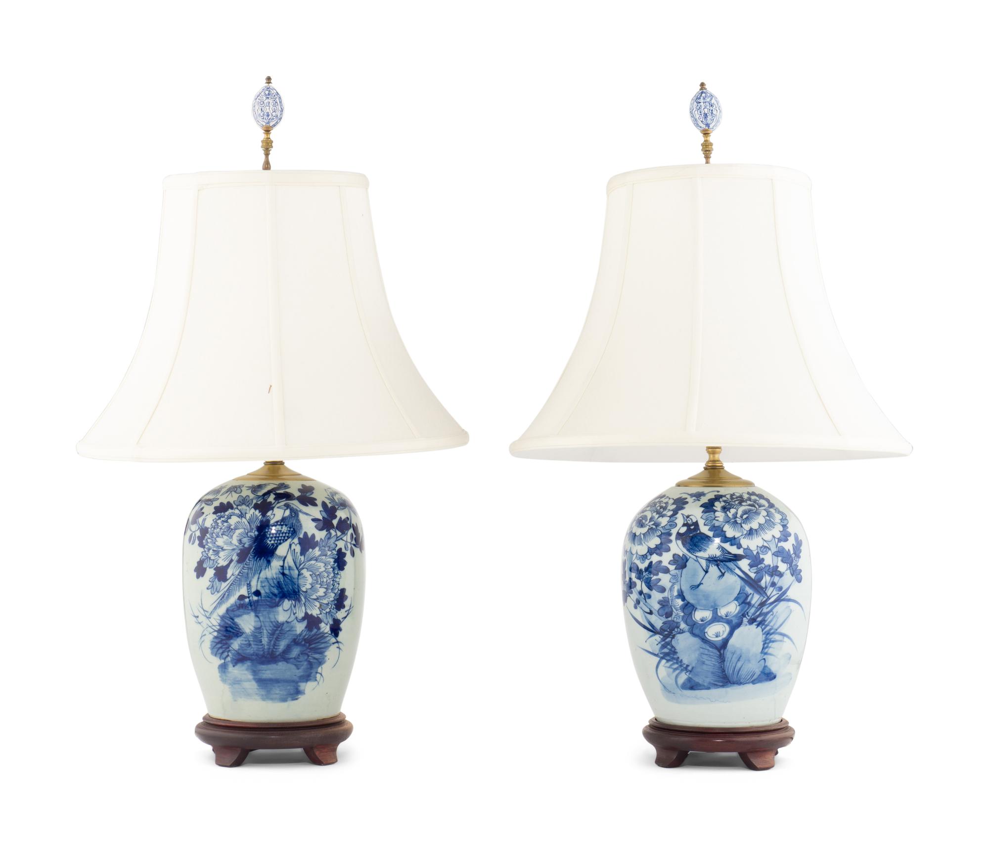 A Pair of Blue and White Porcelain Jars Mounted as Lamps