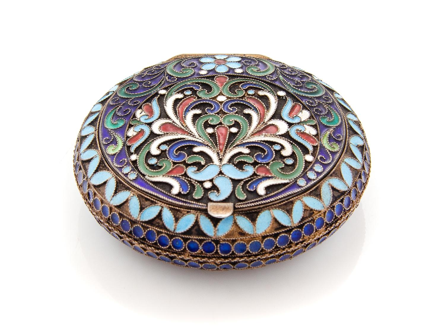 A Russian Enameled Silver Snuff Box, Maker's Mark Cyrillic IZO, Moscow, Mid-20th Century, the circular case with polychrome enameled fl