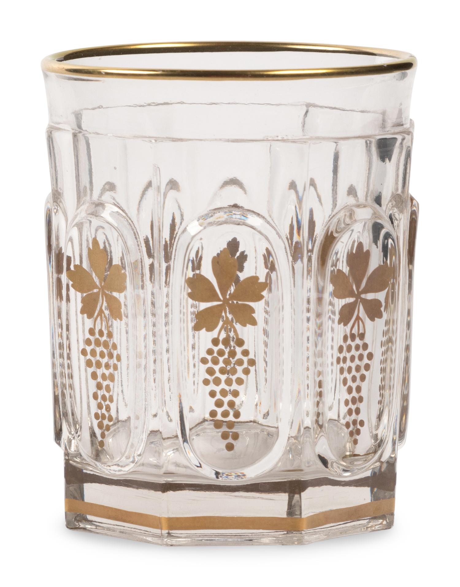 A Val Saint Lambert Gilt Decorated Cut Glass Table Service