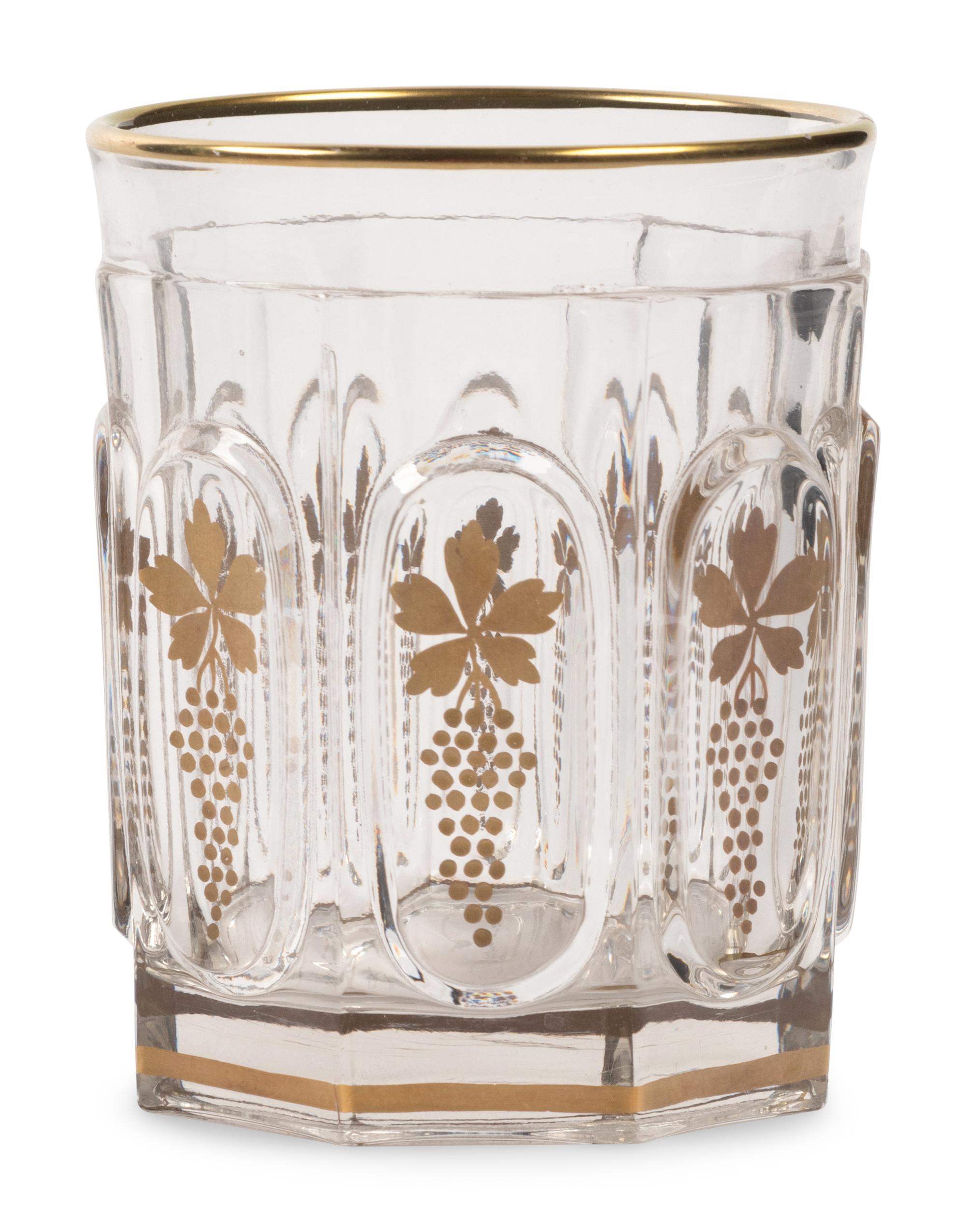 A Val Saint Lambert Gilt Decorated Cut Glass Table Service