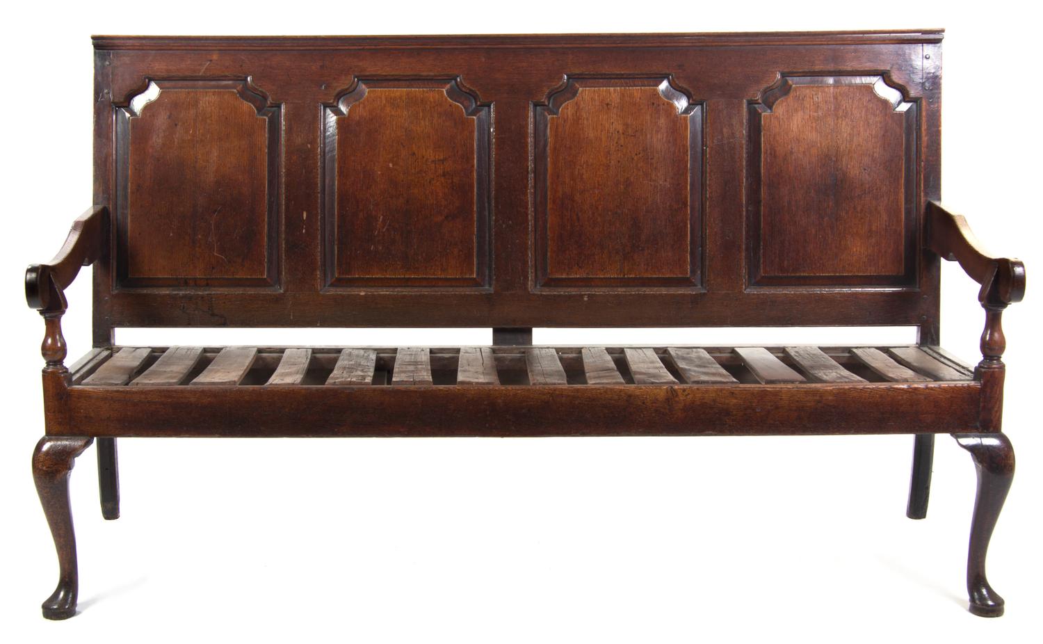 An English Oak Settle, Width 72 inches.