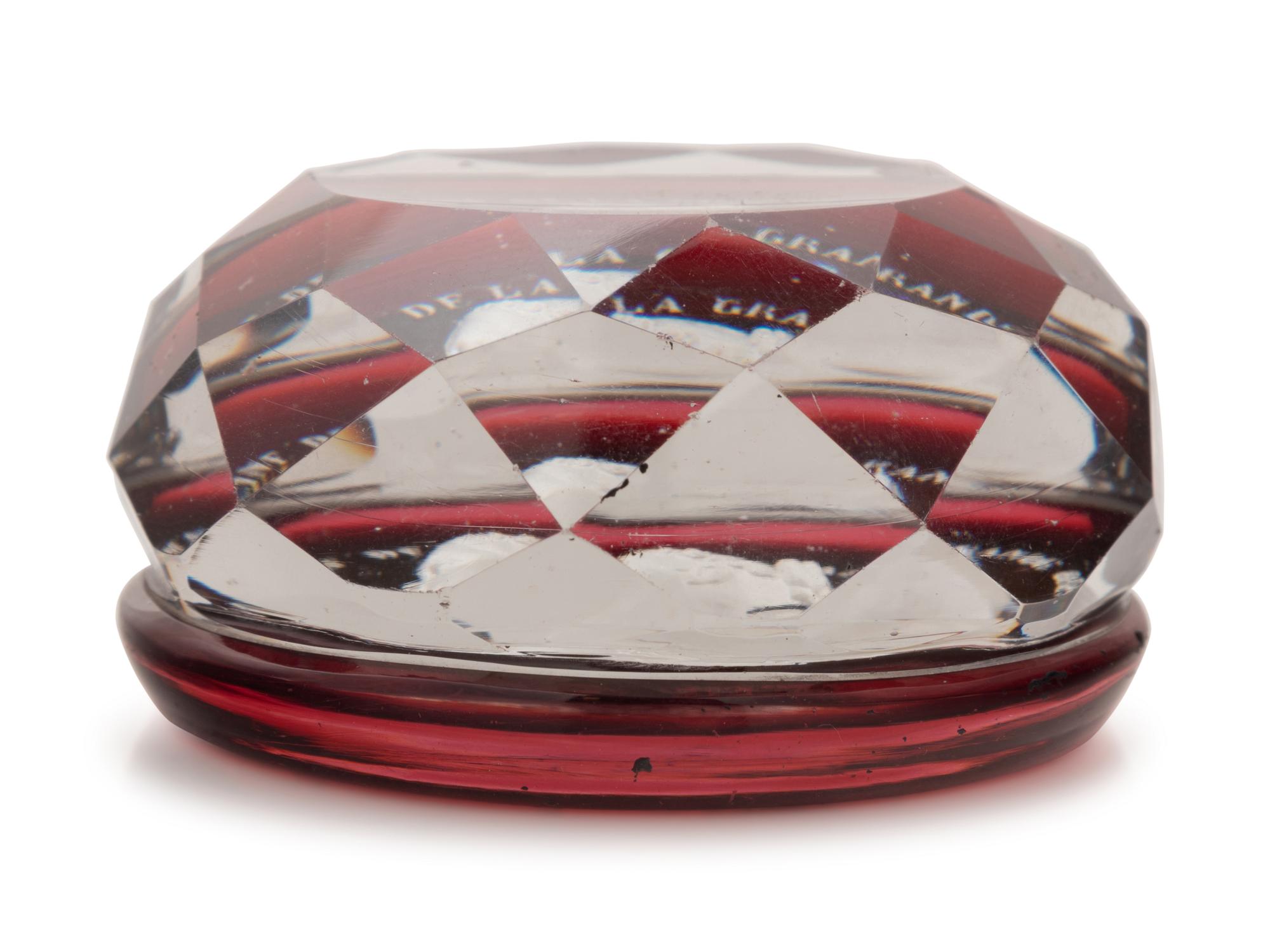 A Baccarat Queen Victoria Sulfide on Ruby Ground Faceted Glass Paperweight