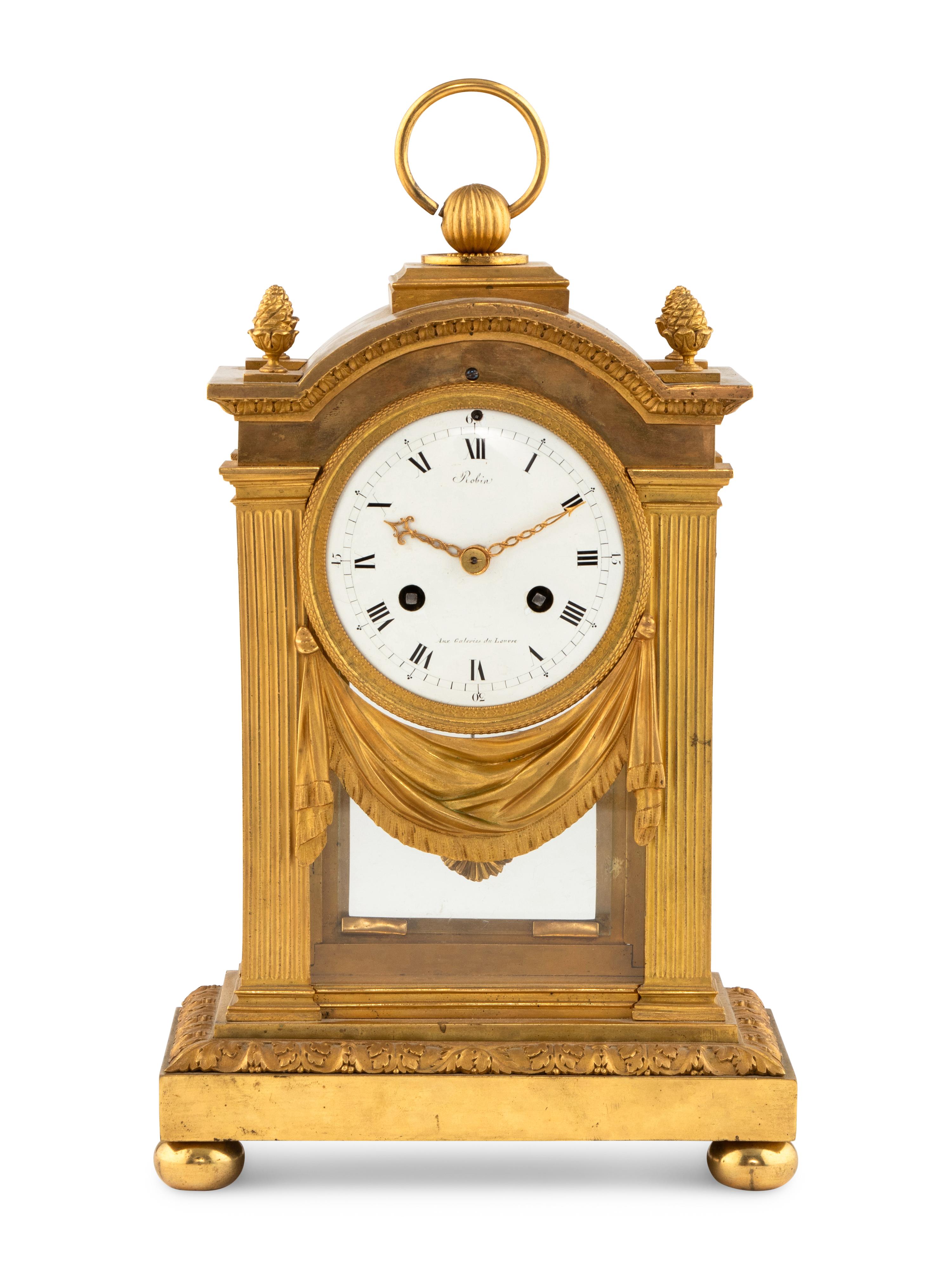 A Louis XVI Gilt Bronze Mantel Clock