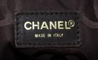 A Chanel Brown Caviar Leather Handbag, 14" x 8" x 5".