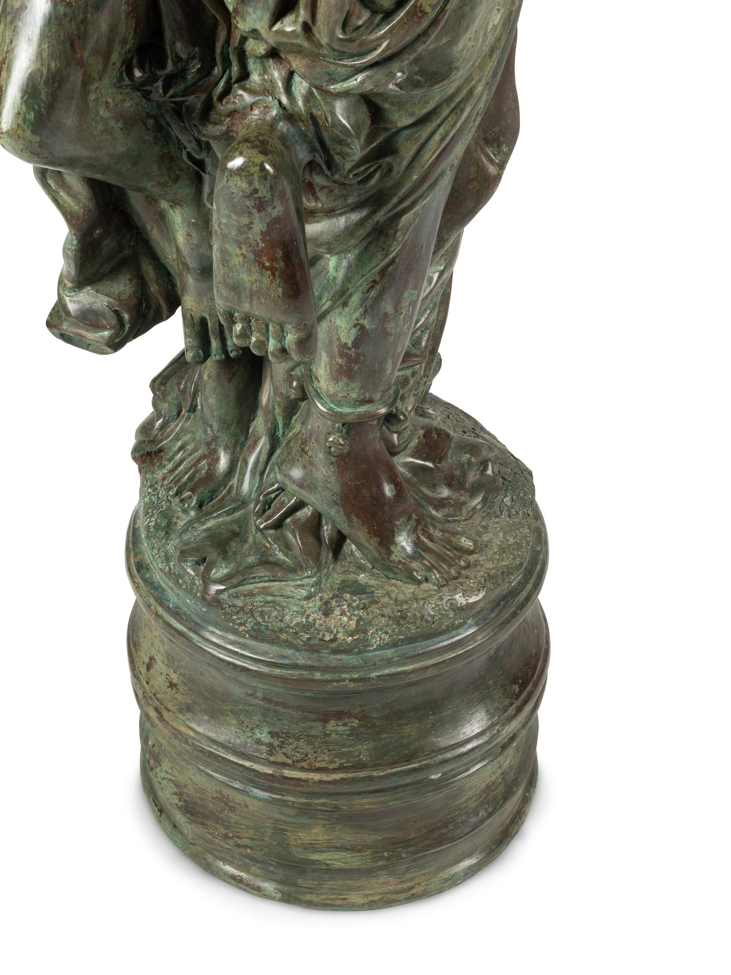 A Large Patinated Bronze Figural Group