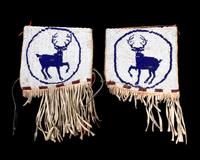 A Pair of Plains Pictorial Cuffs Length of first 7 x 6 1/2 inches.