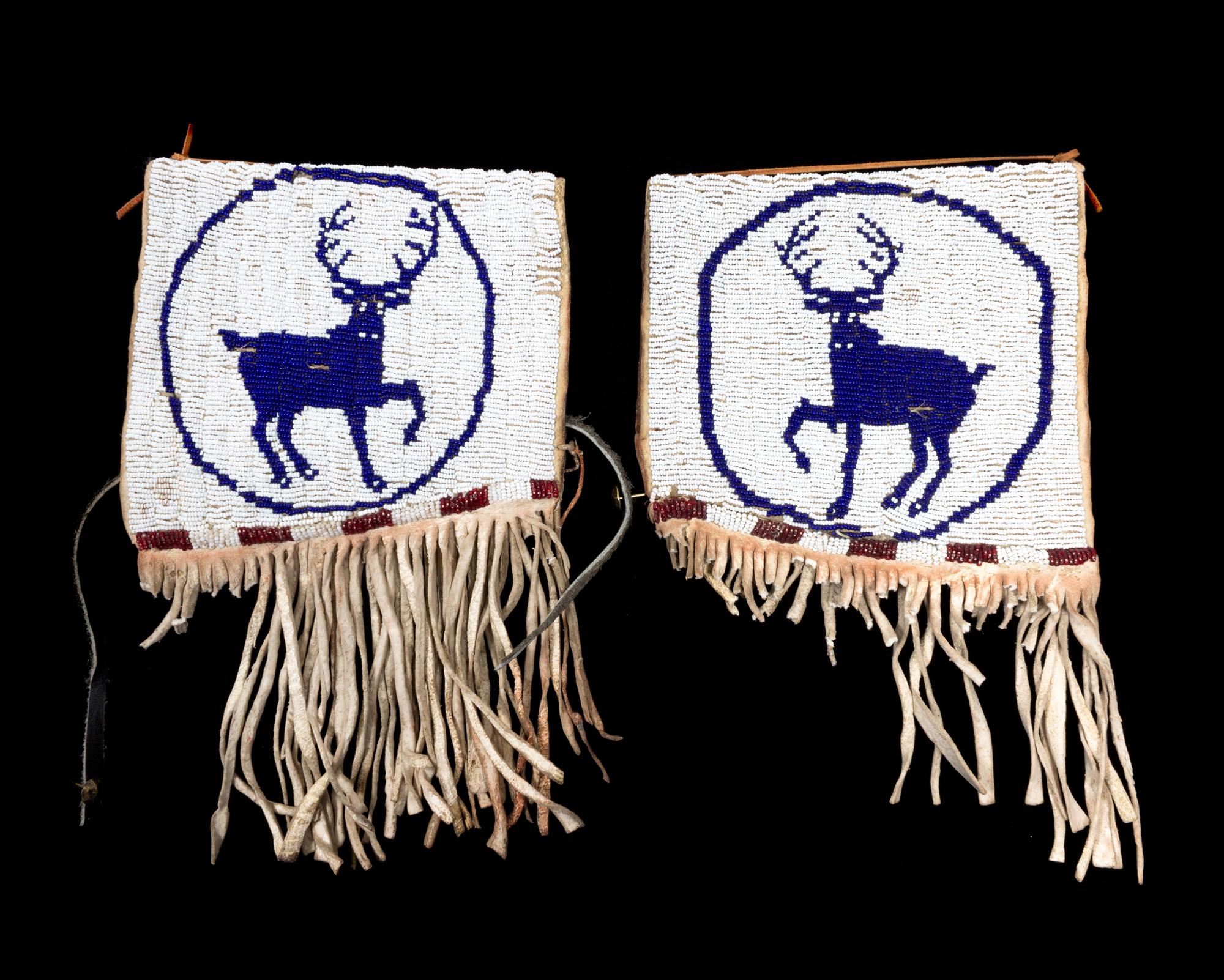 A Pair of Plains Pictorial Cuffs Length of first 7 x 6 1/2 inches.
