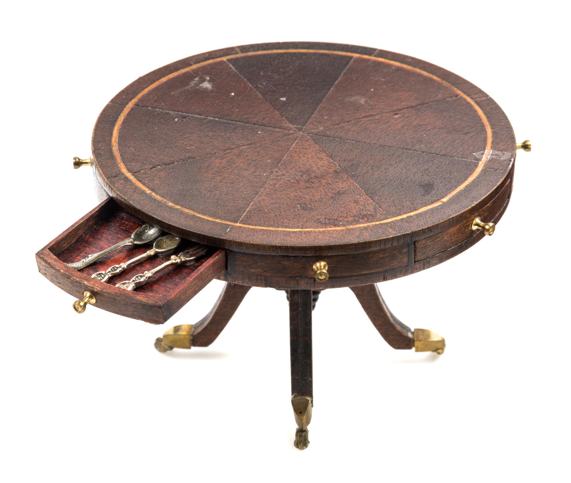 A George III Style Mahogany Drum Table Height 2 5/8 x diameter 4 inches.