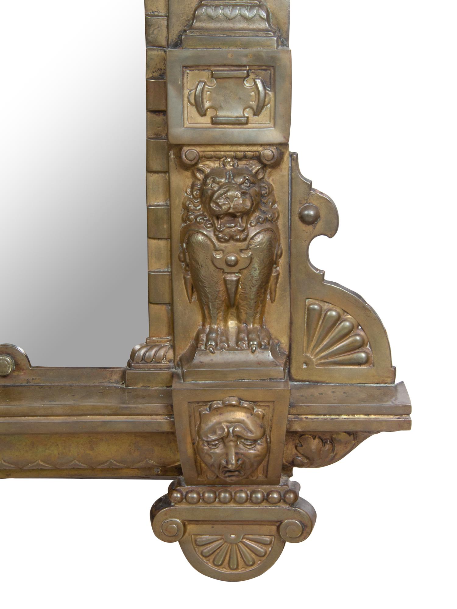 A Renaissance Revival Pressed Brass Mirror