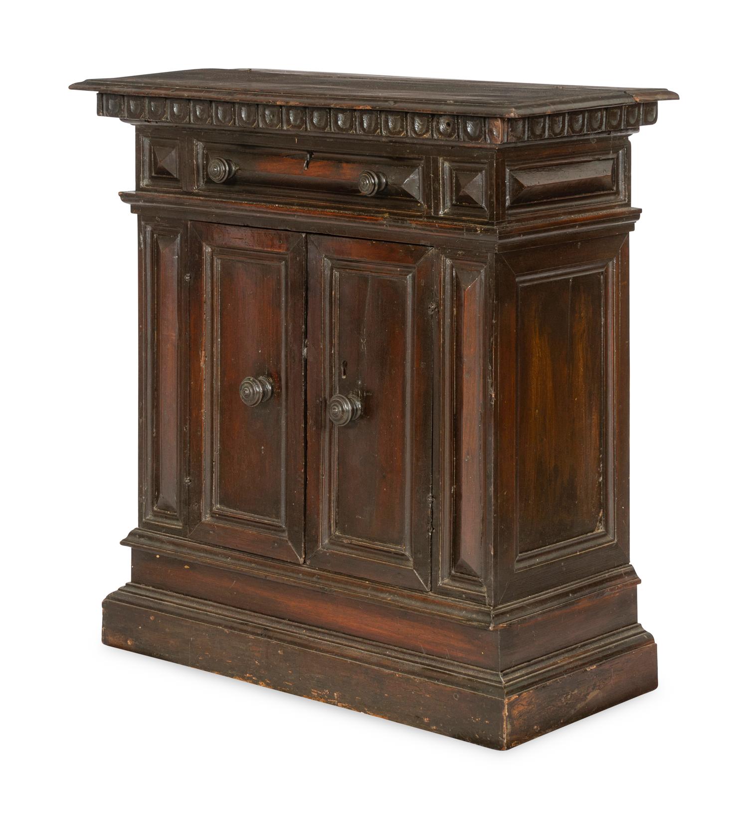 An Italian Baroque Style Walnut Cabinet