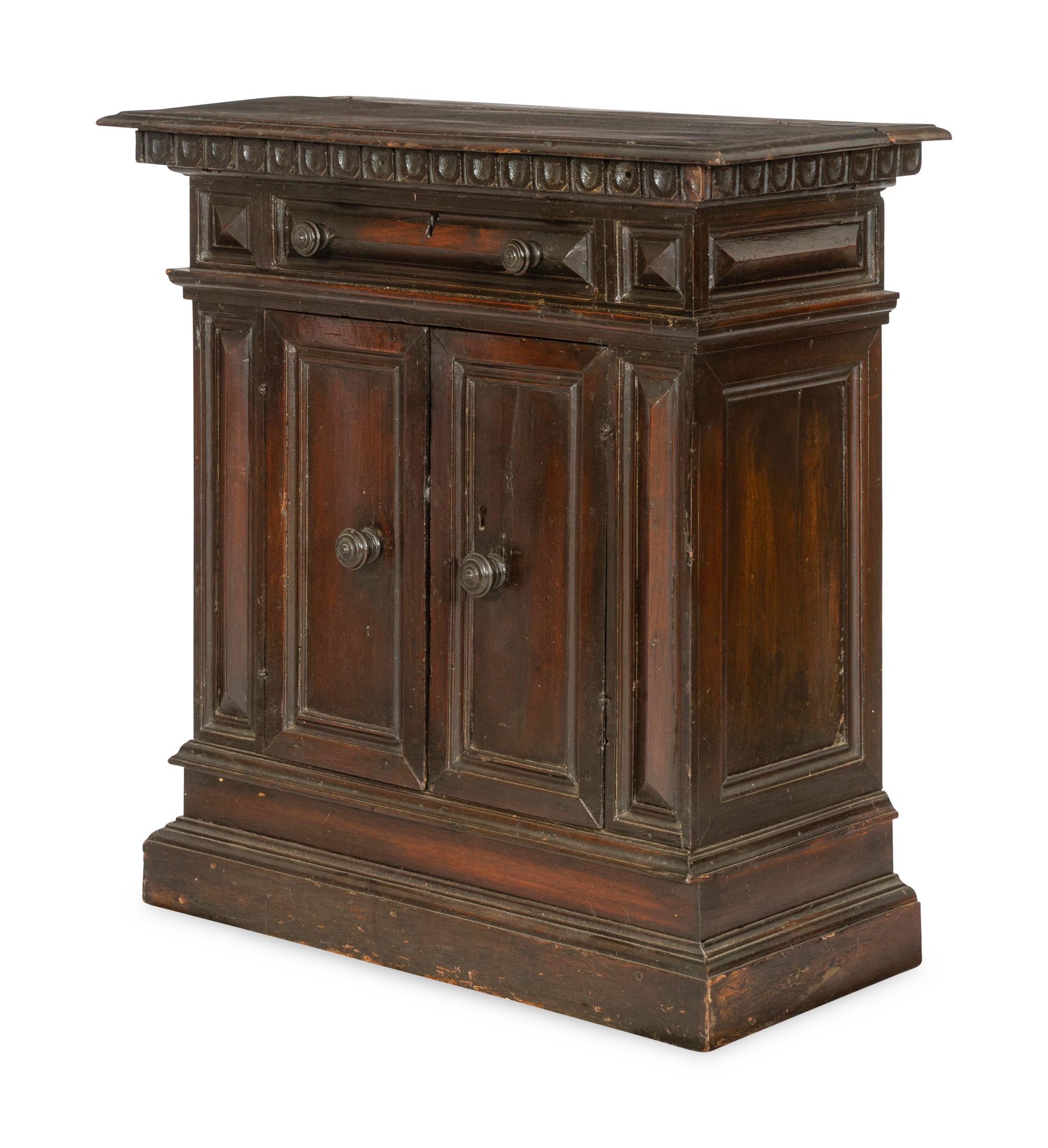 An Italian Baroque Style Walnut Cabinet