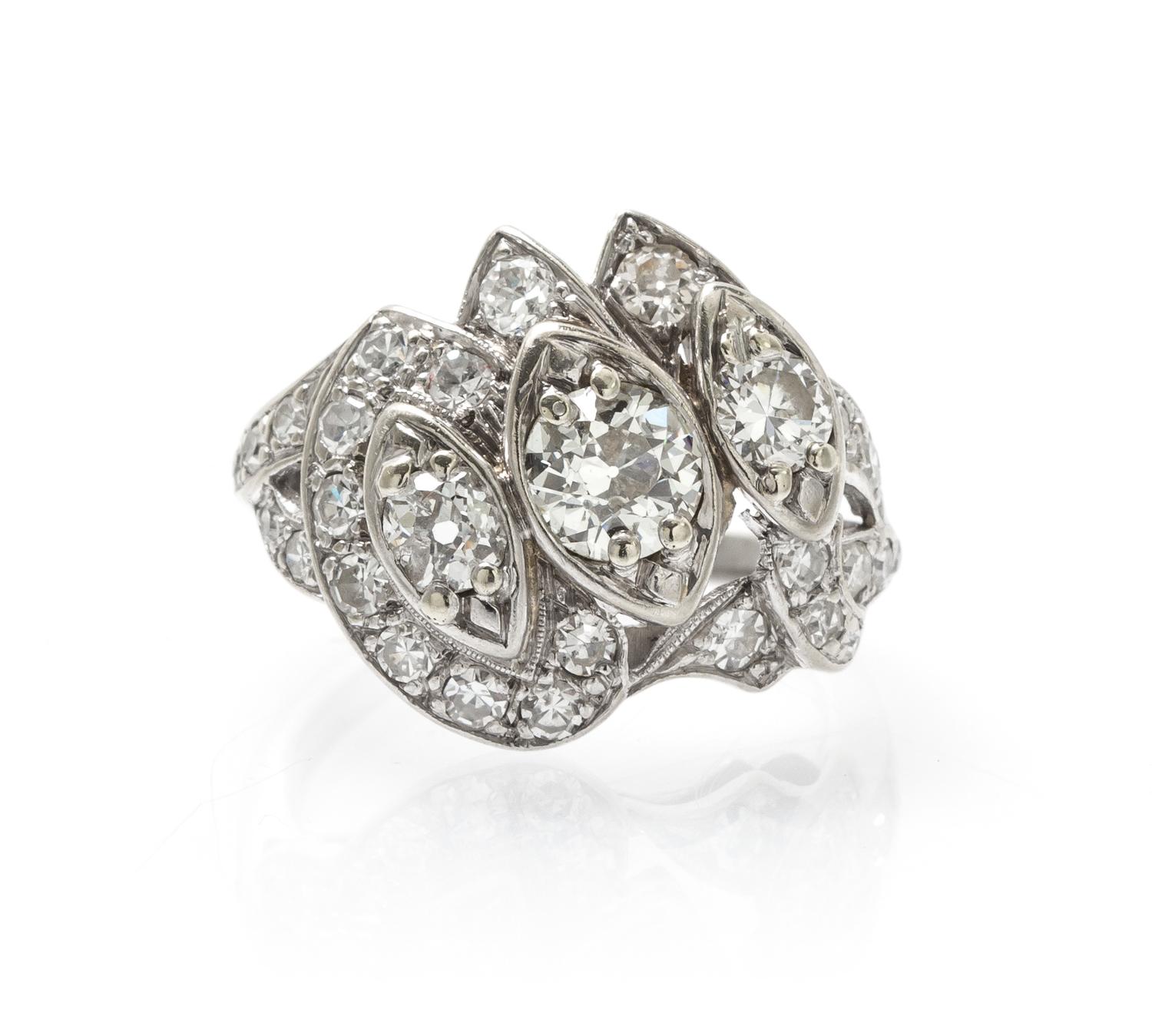 A 14 Karat White Gold and Diamond Ring, 3.70 dwts.