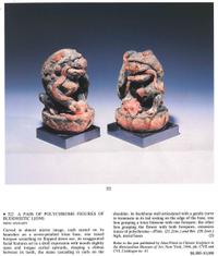 A Pair of Chinese Polychrome Painted Wood Figures of Fu Lions
