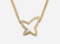 An 18K Yellow Gold Earrings and Necklace Set by Movado