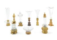 Eight Gilt Bronze and Glass Table Articles