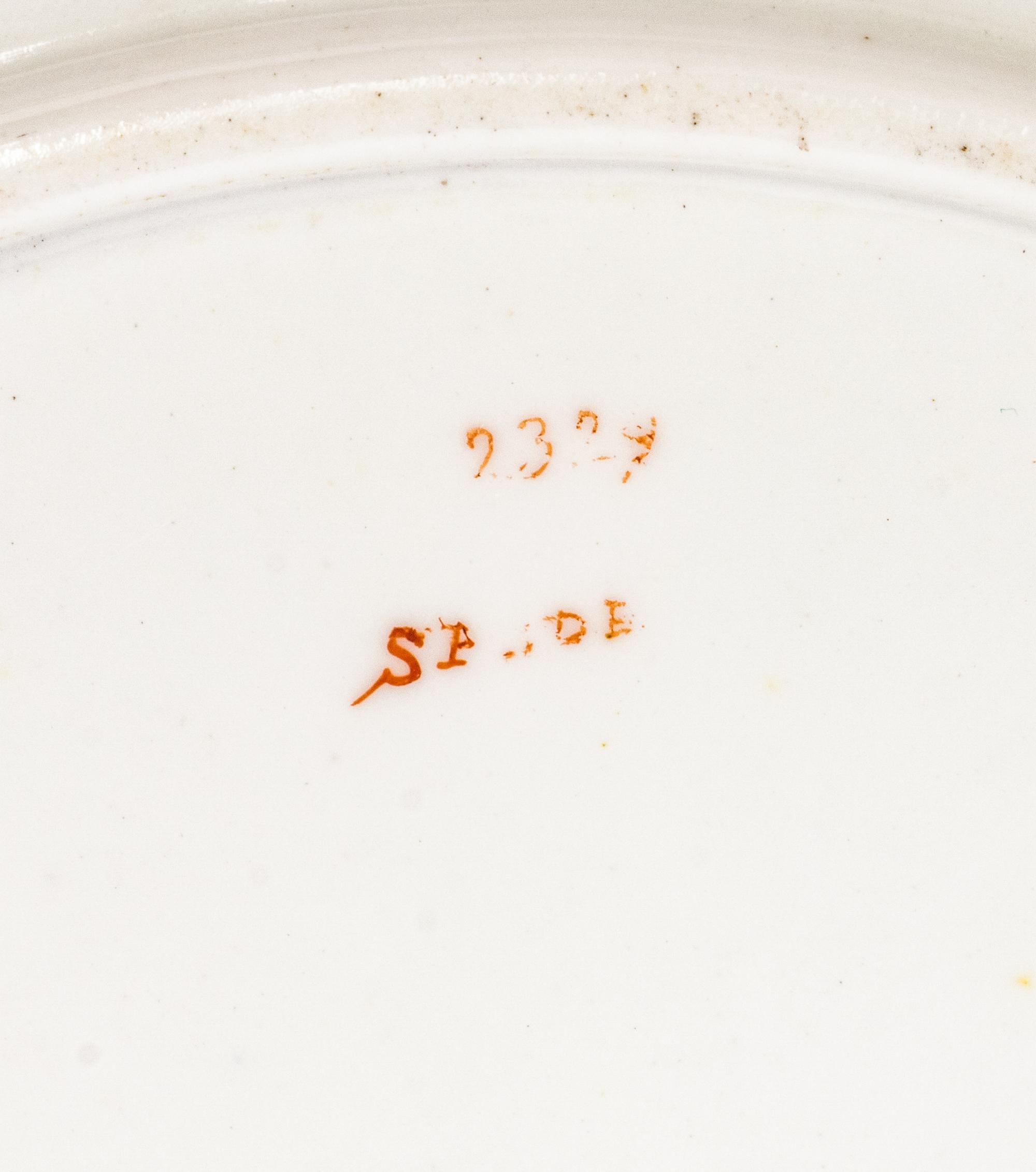 A Spode Pale Blue-Ground Botanical Porcelain Dessert Service