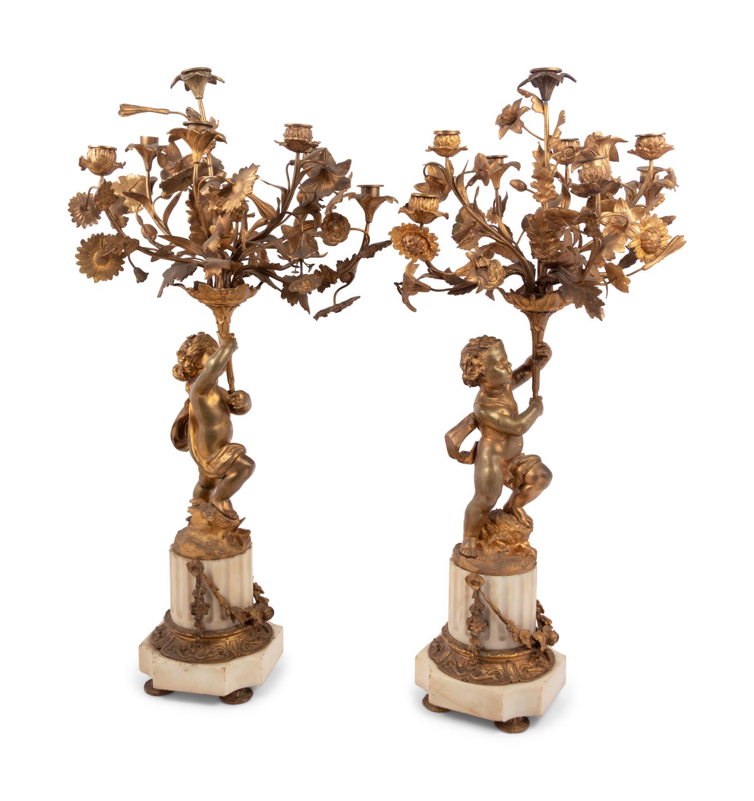 A Pair of French Gilt Bronze and Marble Figural Eight-Light Candelabra