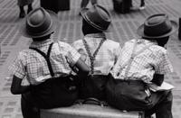 Ruth Orkin (1921-1985) Three Boys on a Suitcase, Penn Station, 1947