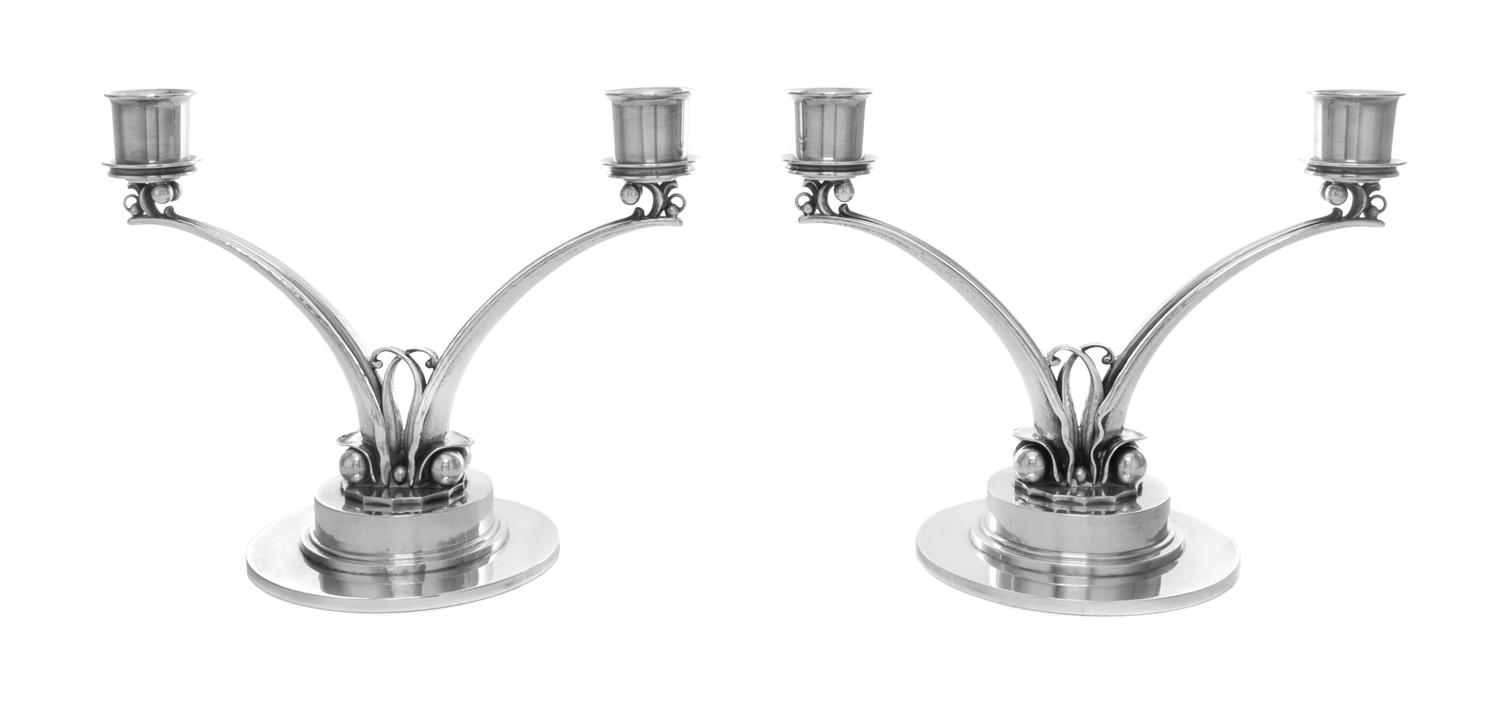 A Pair of Danish Silver Two-Light Candelabra, Harald Nielsen for Georg Jensen Silversmithy, Copenhagen, 1945-77, 278 pattern, the two c