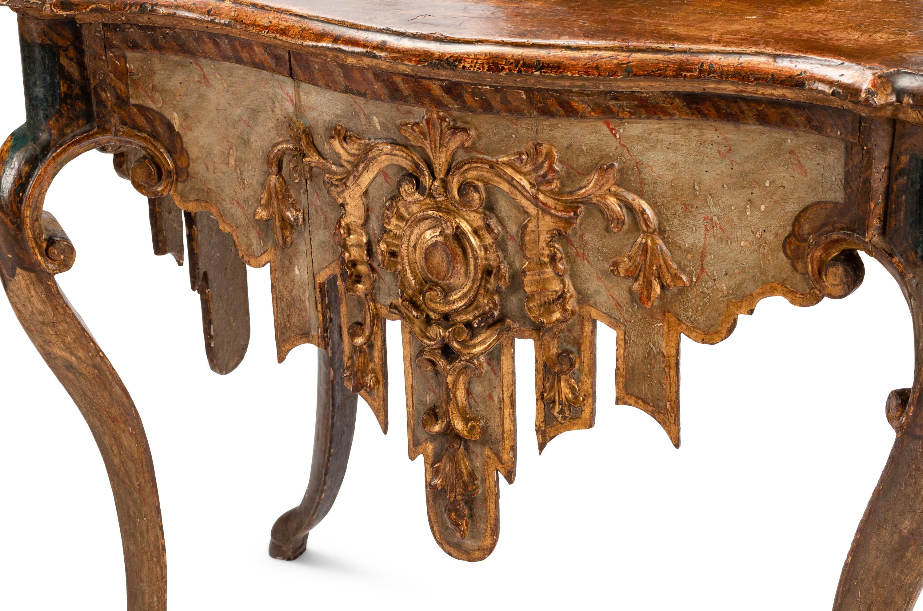 A Pair of Venetian Painted and Parcel Gilt Console Tables