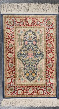 A Persian Silk and Wool Mat 2 feet 6 inches x 1 foot 7 inches. — SECOND HALF 20TH CENTURY