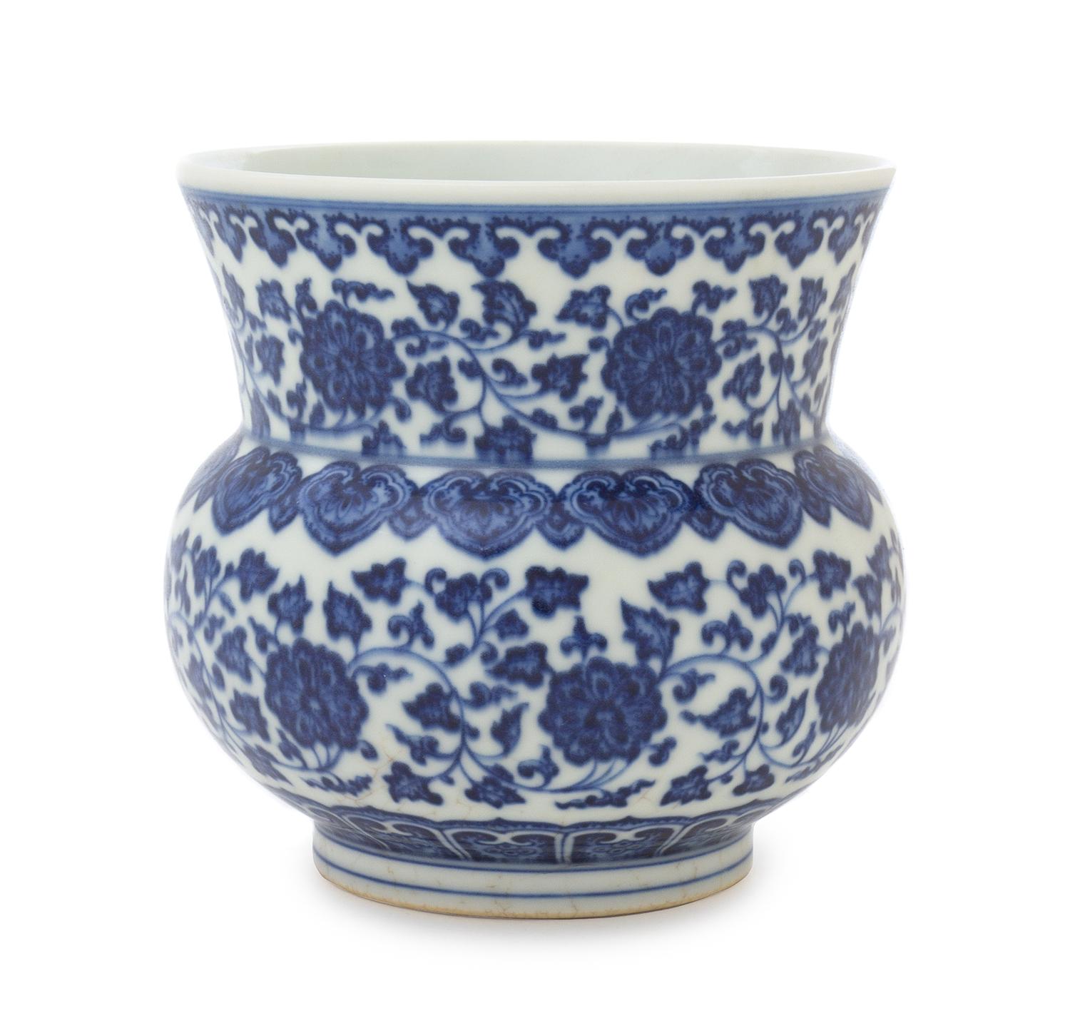 A Blue and White Porcelain Spittoon Diameter 4 3/4 inches.