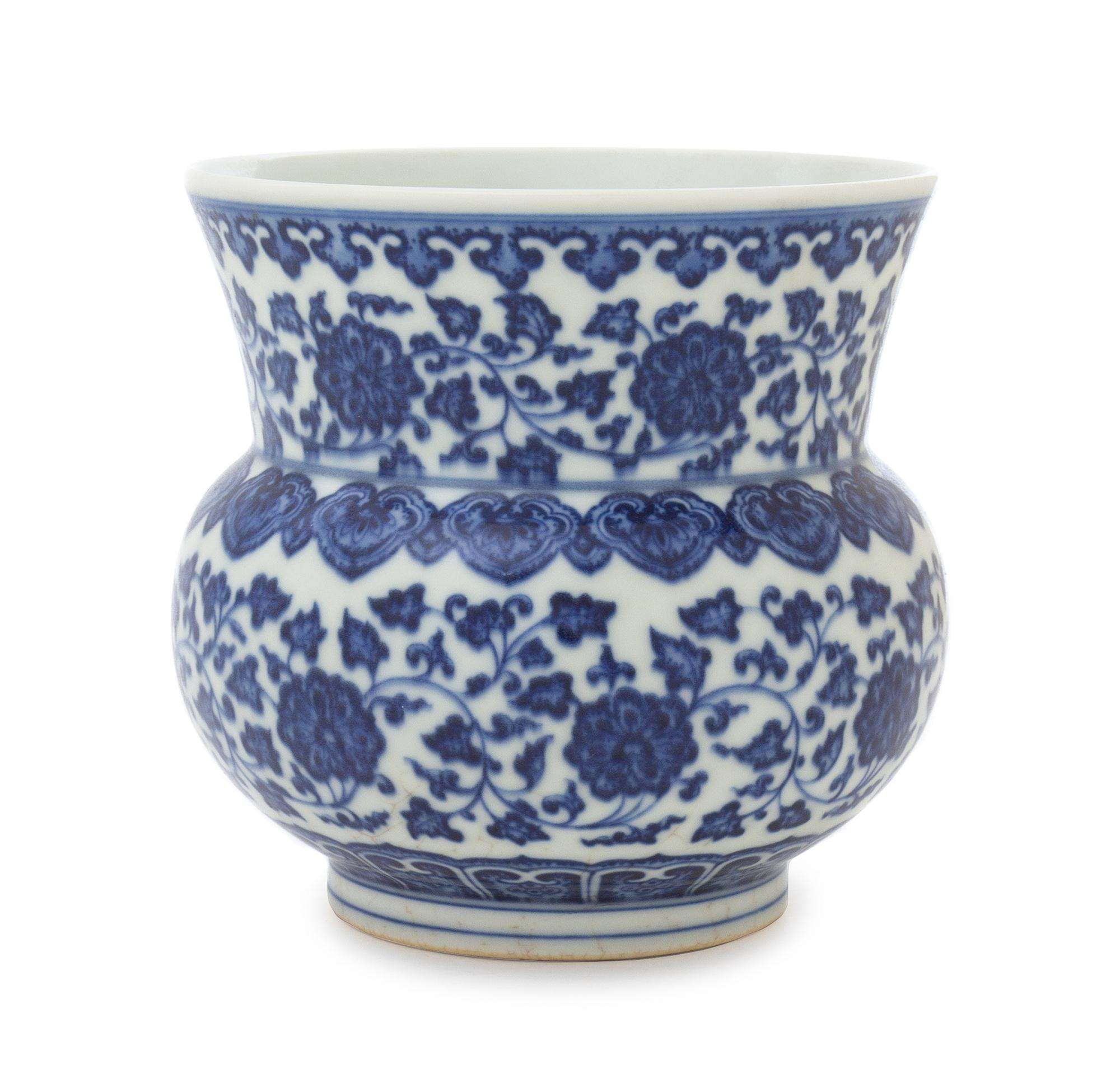 A Blue and White Porcelain Spittoon Diameter 4 3/4 inches.