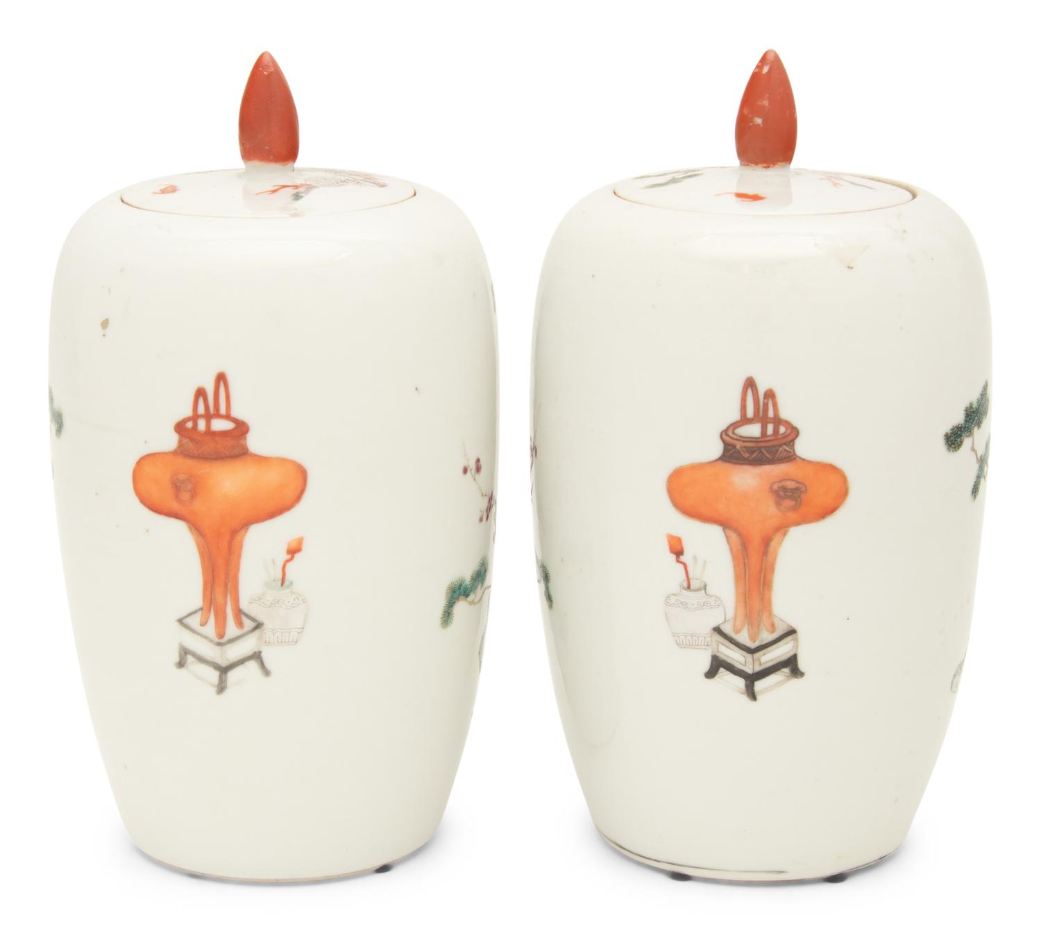 A Pair of Famille Rose Porcelain Ovoid Jars and Covers